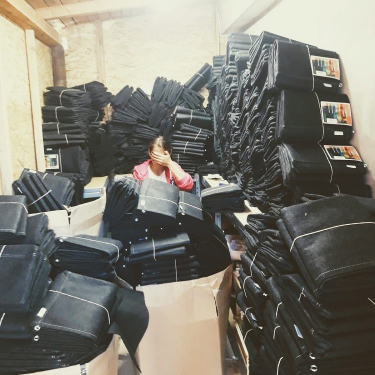 In the workshop with prepared fabric pots.