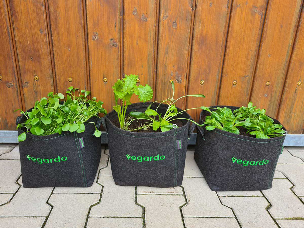 Gronest fabric pots with an embroidered Vegardo logo